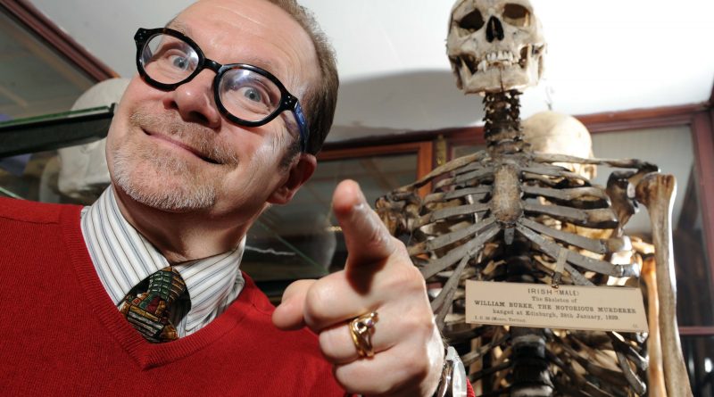 Joe Goldblatt with a skeleton